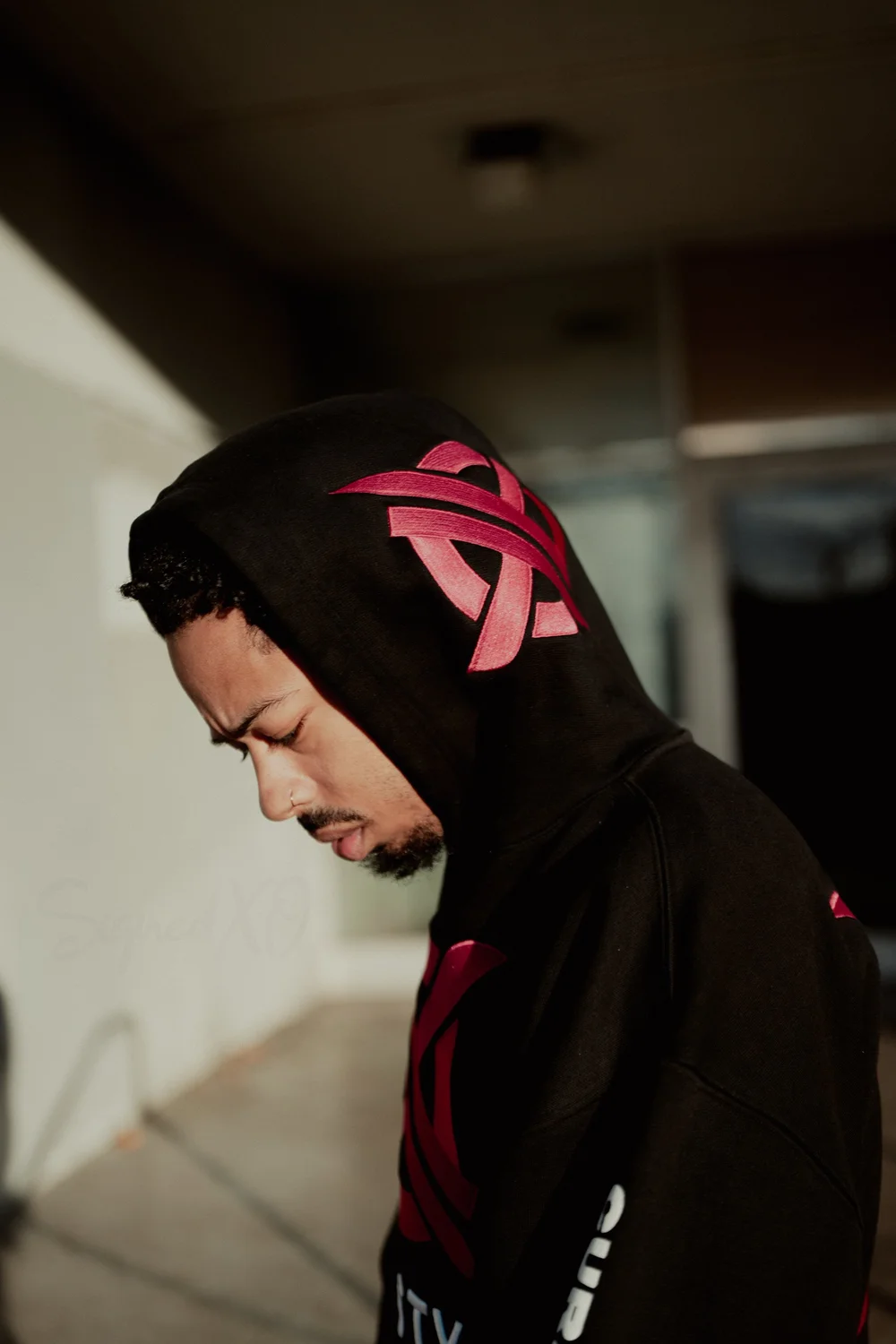 Signed XO wearing XO Lifestyle apparel